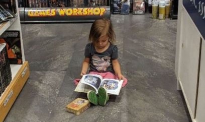 Child reading on floor