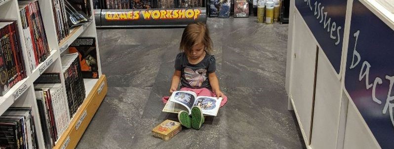 Child reading on floor